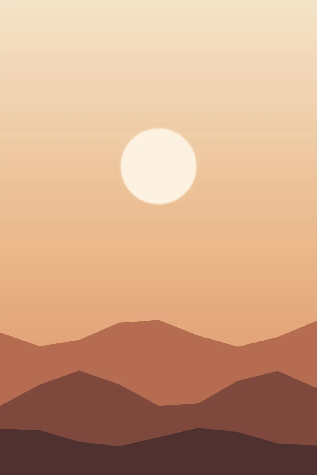 A tall view of hills under a large sun